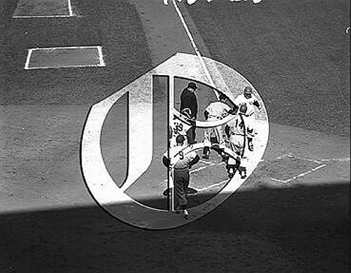 Yogi Berra greeted at home plate at Ebbets Field56N0285